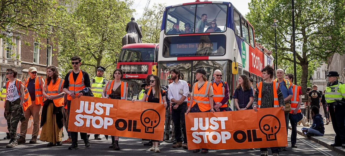 ust_Stop_Oil_Activists_Walking_Up_Whitehall